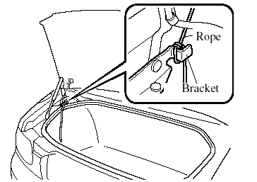 7. Open the trunk using the key, and tie