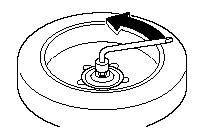 4. Turn the tire hold-down bolt