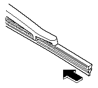 4. Carefully insert the new blade rubber.